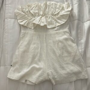 Selling princess Polly white ruffle romper size US two